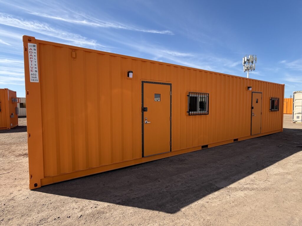 40 foot container all office exterior, angled front view with two doors and barred windows